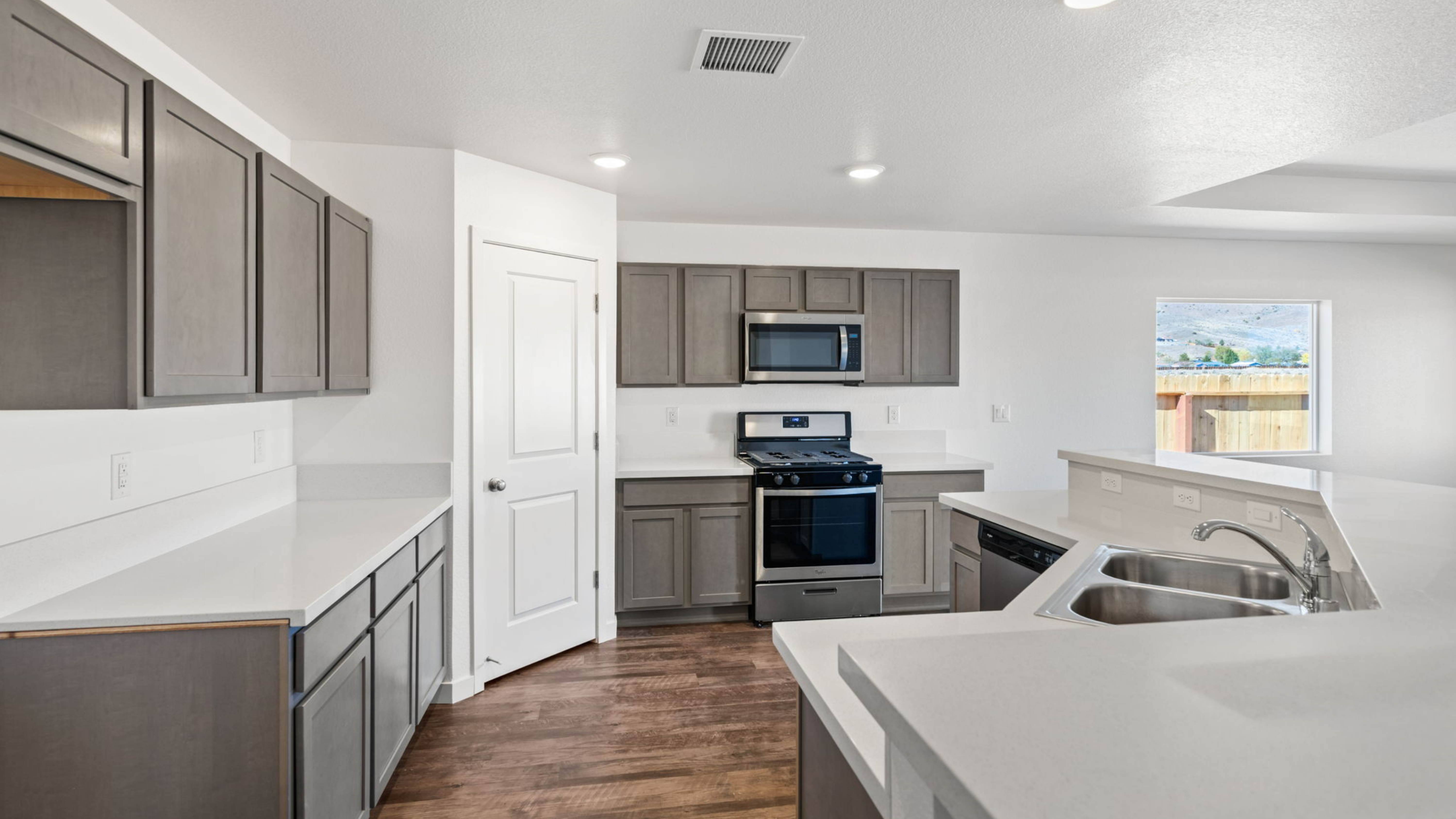 Interior of a GC Phase 4 house showing a modern kitchen with quality finishes.